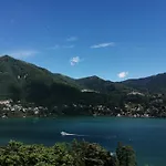 Between Mountains And * Carate Urio