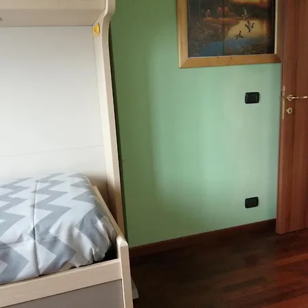 Between Mountains And * Carate Urio