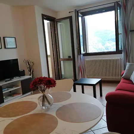 Between Mountains And Carate Urio