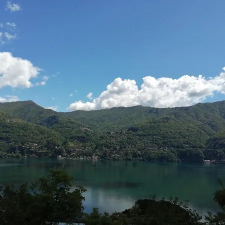 Between Mountains And Nyaraló Carate Urio